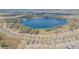 Breathtaking aerial view of the community surrounding a large lake at 928 Cambridge Dr, Winter Haven, FL 33881