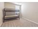 Bedroom featuring carpet, window, neutral colors, and a bunk bed at 928 Cambridge Dr, Winter Haven, FL 33881