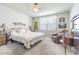 Comfortable bedroom with a ceiling fan and neutral décor at 928 Cambridge Dr, Winter Haven, FL 33881