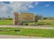 Elegant stone community sign for Lucerne Park Reserve set against a blue sky at 928 Cambridge Dr, Winter Haven, FL 33881