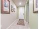 Inviting entryway featuring tile floors and a neutral color palette at 928 Cambridge Dr, Winter Haven, FL 33881