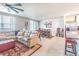 Open floor plan featuring living, dining, and kitchen areas with tile flooring at 928 Cambridge Dr, Winter Haven, FL 33881