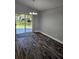 Dining room featuring stylish flooring and sliding glass doors to the backyard at 716 Byni Rdg, Winter Haven, FL 33880