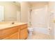 Bathroom with a combination tub and shower, and a wooden vanity at 1229 Sebastian Cv, Lake Mary, FL 32746