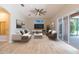 Spacious living room filled with natural light and access to the lanai at 1229 Sebastian Cv, Lake Mary, FL 32746