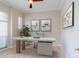 Office features bright windows, sleek desk, and refined decor at 1229 Sebastian Cv, Lake Mary, FL 32746