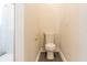 Powder room featuring a modern toilet, light fixtures and neutral walls at 1229 Sebastian Cv, Lake Mary, FL 32746