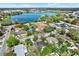 Aerial view of neighborhood with lake and landscaped properties at 2421 Cypress Ln, Lakeland, FL 33801