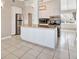Modern kitchen with stainless steel appliances and a center island with granite countertops at 2421 Cypress Ln, Lakeland, FL 33801