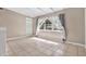 Sunlit room with large window, tile flooring, and neutral color palette at 2421 Cypress Ln, Lakeland, FL 33801
