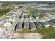 Planned community aerial view showcasing rows of houses and neighborhood lakes at 2506 Linda Knoll Ln, Bartow, FL 33830
