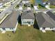 An aerial view showcases the neighborhood homes with well-maintained lawns and the community's appealing layout at 2506 Linda Knoll Ln, Bartow, FL 33830
