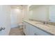 Modern bathroom featuring double vanity with granite countertops, tiled shower, and modern fixtures at 2506 Linda Knoll Ln, Bartow, FL 33830