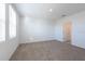 Bright bedroom with neutral carpeting and a large window at 2506 Linda Knoll Ln, Bartow, FL 33830