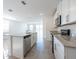Modern kitchen with granite countertops and stainless steel appliances at 2506 Linda Knoll Ln, Bartow, FL 33830