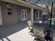 Inviting covered patio with outdoor seating, perfect for entertaining near the pool at 2691 Cedaridge Cir, Clermont, FL 34711