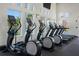 Bright fitness center with modern cardio equipment, large windows, and scenic outdoor views at 5103 Bridgehaven Rd, Davenport, FL 33837