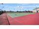 Community tennis courts featuring professional-grade surfaces and lighting for day or night play at 5103 Bridgehaven Rd, Davenport, FL 33837