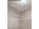 Attic space showing the access panel and shelves at 6372 Raleigh St # 1911, Orlando, FL 32835