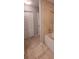 This bathroom includes a bathtub with tile walls and a closet in the corner at 6372 Raleigh St # 1911, Orlando, FL 32835