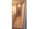 The bathroom has light-colored cabinets, decorative countertops, and a view into the closet at 6372 Raleigh St # 1911, Orlando, FL 32835