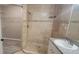 A bathroom with dual shower heads, white tiles, and a bright vanity area is shown at 6372 Raleigh St # 1911, Orlando, FL 32835