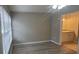 This bedroom is connected to a bathroom with light-colored walls and a ceiling fan at 6372 Raleigh St # 1911, Orlando, FL 32835