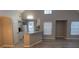 Open-concept kitchen featuring light cabinets, granite countertops, and modern appliances for easy meal preparation at 6372 Raleigh St # 1911, Orlando, FL 32835