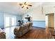 Living room showcasing flooring, french doors, and a comfortable seating arrangement at 3312 Sangria Pass, Lakeland, FL 33811