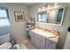 Charming bathroom with a granite countertop vanity and neutral wall color at 5020 Old Lucerne Park Rd, Winter Haven, FL 33881