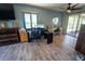 Bright office space with a desk, workstation, and a view of the lake at 5020 Old Lucerne Park Rd, Winter Haven, FL 33881