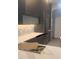 Modern kitchen featuring gray cabinets, stainless steel appliances, and white quartz countertops at 254 Chelsea Ave, Davenport, FL 33837