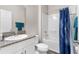 Clean bathroom featuring granite vanity, and a tub with shower featuring a stylish shower curtain at 1532 Axel Cir, Winter Haven, FL 33880