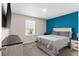 Cozy bedroom with large window, comfortable bed, and modern furnishings at 1532 Axel Cir, Winter Haven, FL 33880
