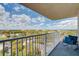 Balcony with railing provides stunning views of the city skyline and a seating to enjoy it at 13415 Blue Heron Beach Dr # 1201, Orlando, FL 32821