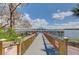 Community dock with water views and shaded gazebo; enjoy lakeside living at 13415 Blue Heron Beach Dr # 1201, Orlando, FL 32821