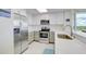 Well-equipped kitchen featuring stainless steel appliances, stylish cabinetry, and a functional layout at 13415 Blue Heron Beach Dr # 1201, Orlando, FL 32821