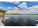 Breathtaking view of the lake from a covered dock with boat access at 13415 Blue Heron Beach Dr # 1201, Orlando, FL 32821