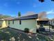 Charming home exterior featuring a well-maintained yard and enclosed patio at 669 Eagle Run, Lakeland, FL 33809