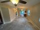 Open floor plan seamlessly connecting living room and kitchen at 669 Eagle Run, Lakeland, FL 33809