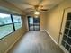 Bright sun room with large windows and access to the backyard at 669 Eagle Run, Lakeland, FL 33809