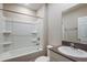 Bathroom featuring a shower-tub combo, a single sink with gray countertop and a mirror at 1014 Foreshore Ln, Haines City, FL 33844
