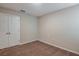 Neutral bedroom with carpet and a double door closet at 1014 Foreshore Ln, Haines City, FL 33844