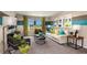 Comfortable living room featuring a plush sofa, stylish seating, and modern decor with vibrant colors and a bright window view at 1612 Ellesmere Ave, Haines City, FL 33844