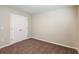 Cozy bedroom features a spacious closet with white doors and modern carpeting at 4063 Gardenia Ave, Lake Hamilton, FL 33851
