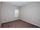 Cozy bedroom with neutral paint and plush carpeting at 4063 Gardenia Ave, Lake Hamilton, FL 33851