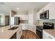Spacious kitchen with stainless steel appliances, an island, and a modern design at 4063 Gardenia Ave, Lake Hamilton, FL 33851