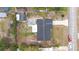 From above, see the home's layout, including the backyard, shed, and proximity to the street and neighboring houses at 122 2Nd Jpv St, Winter Haven, FL 33880
