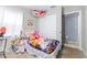 Bright bedroom with a large closet and cute decor creating a cozy atmosphere at 122 2Nd Jpv St, Winter Haven, FL 33880