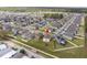 Location aerial view of the property surrounded by homes, green spaces, and community amenities in a planned community at 1773 Yellow Trl, Lakeland, FL 33801
